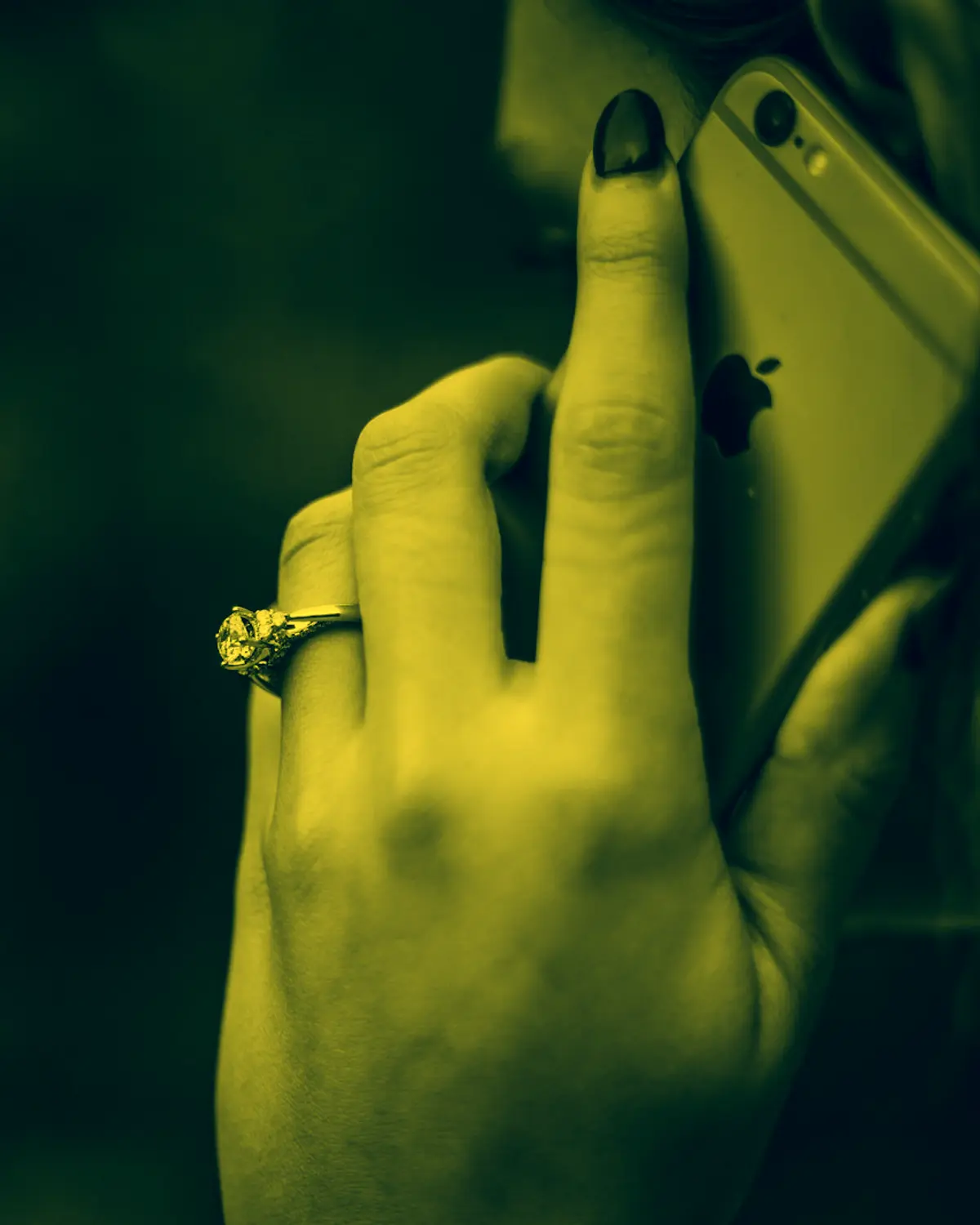Parent taking a call, yellow duotone