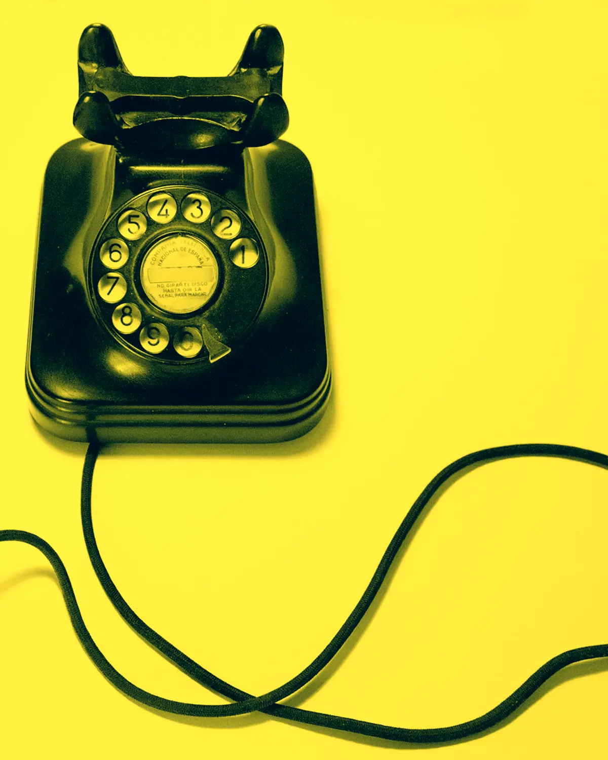 Rotary phone, yellow duotone